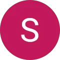 Runder, rosa Hintergrund mit einem weißen S.